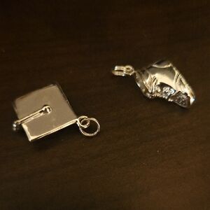Two Vintage Sterling Silver Charms